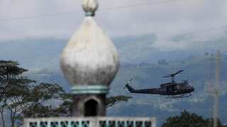 Bodies of civilians dumped near Philippines city besieged by Islamists