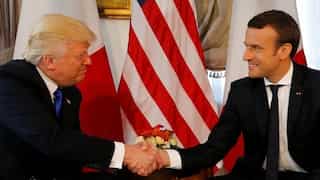 Macron speaks about 'moment of truth' handshake with Trump