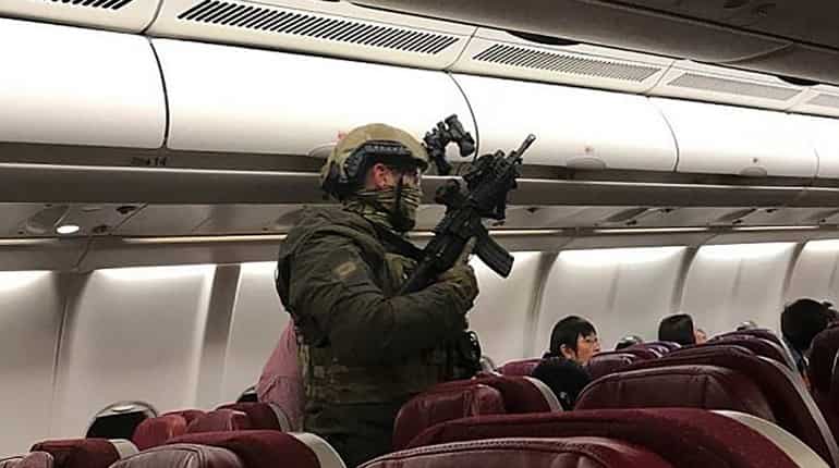 Malaysia Airlines flight returns to Australia after passenger with 'bomb' tries to enter cockpit