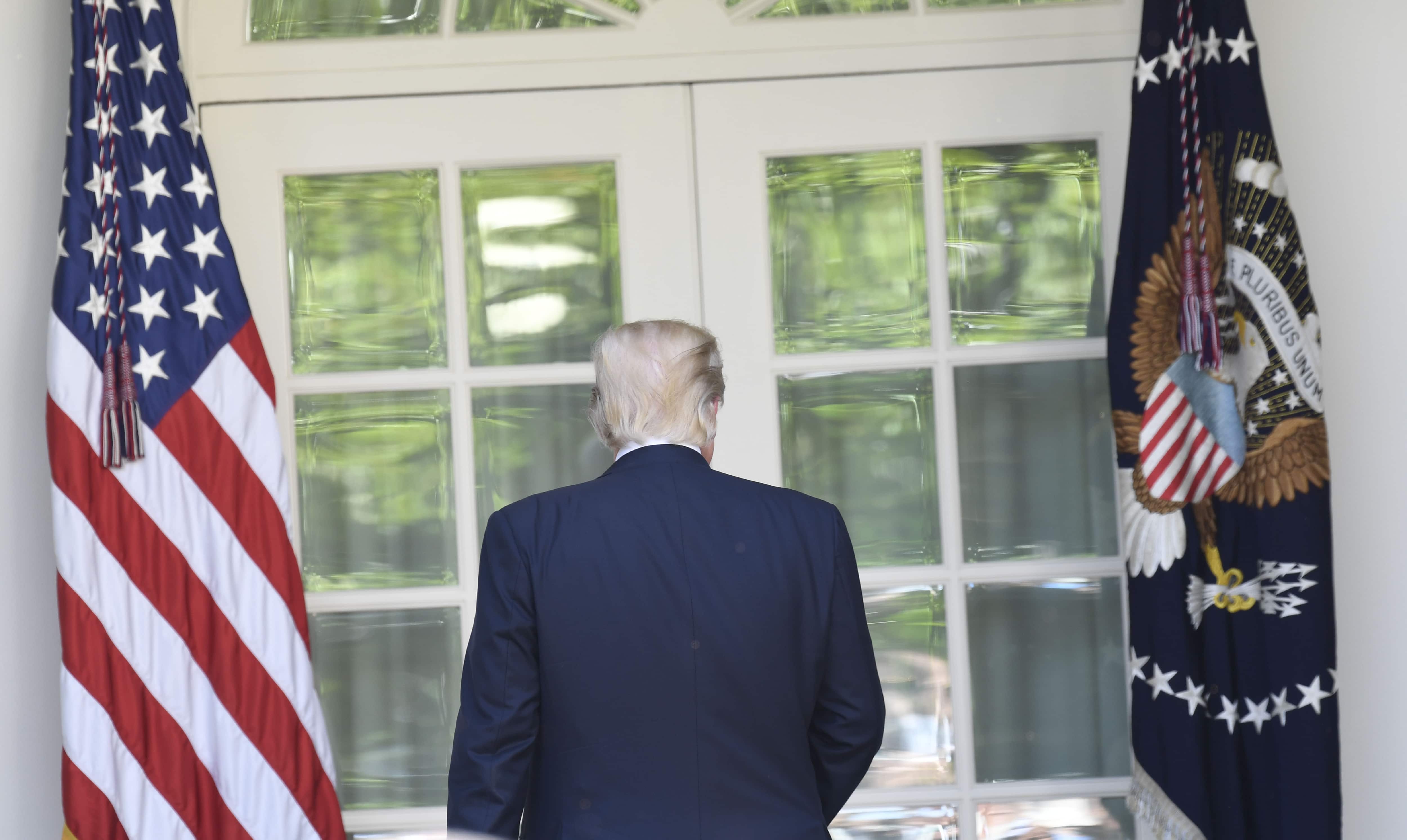 Trump officially withdraws from 'punishing' Paris climate pact