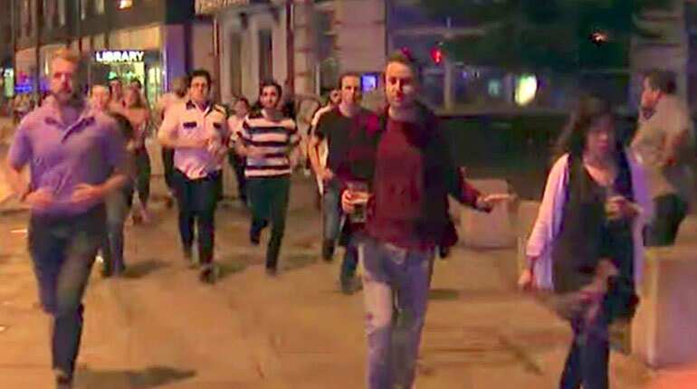 One for the road? Pint-clutching man becomes symbol of London's defiance