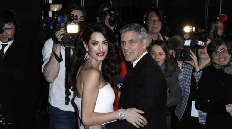 George and Amal Clooney welcome twins