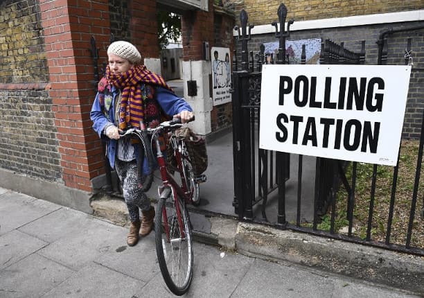 In shadow of terror, Britons vote in key election