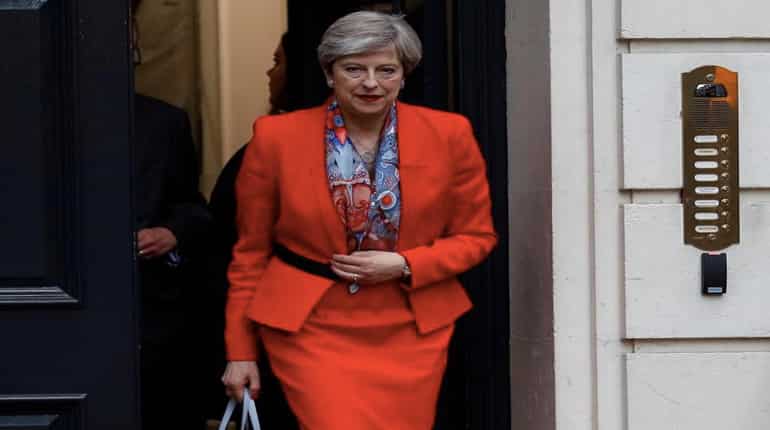Britain's May reaches 'outline' power deal, Brexit talks to begin in 'next couple of weeks'