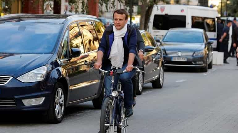 Macron seeks majority as France votes for new parliament