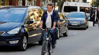 Macron seeks majority as France votes for new parliament