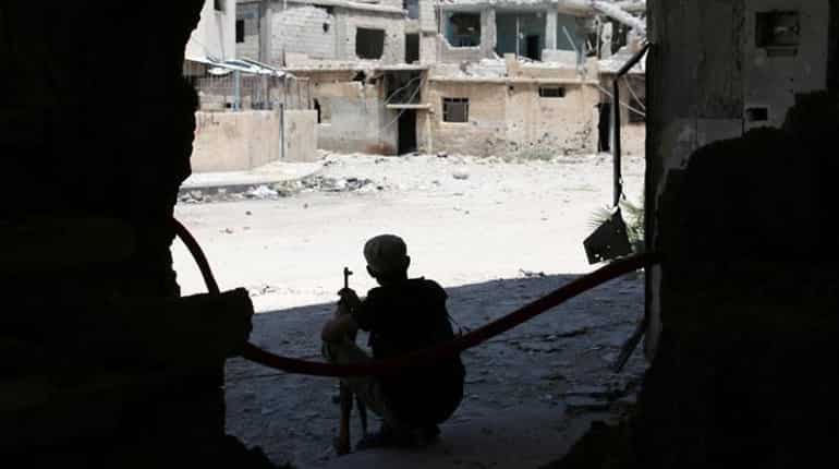 Syrian army declares city ceasefire as Russia, UN plan July peace talks