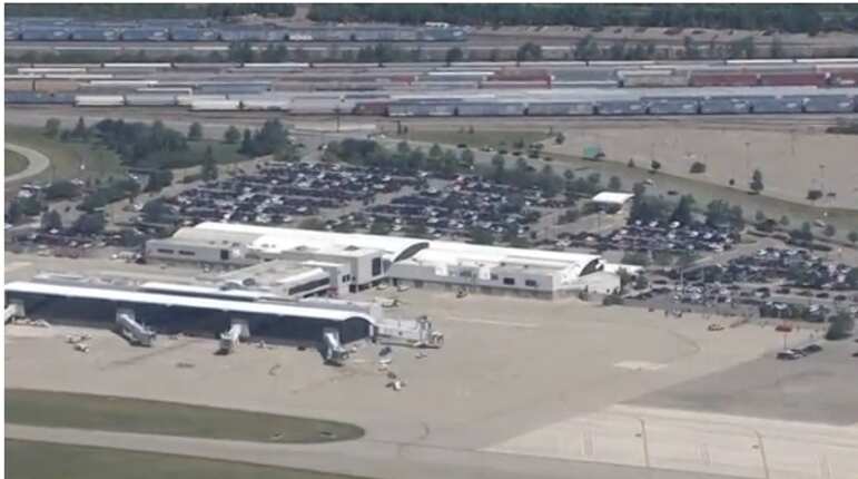 Canadian authorities raid home of Michigan airport stabbing suspect