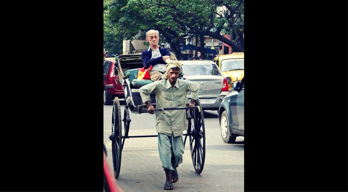 Human rickshaw puller