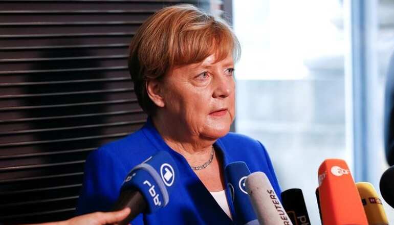 Germany legalises gay marriage, but Merkel votes against it