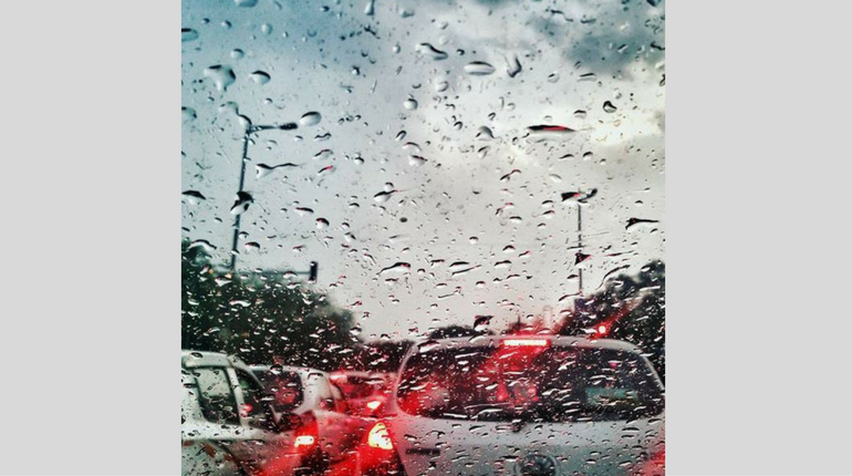 People stuck in traffic due to heavy rain