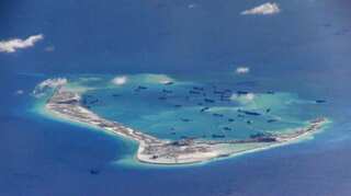 From Chinese missile shelters to US warships, the South China Sea conflict is heating up