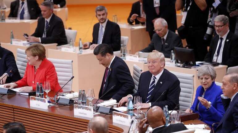 G-20 leaders isolate Trump on climate, say Paris accord 'irreversible' G-20 leaders isolate Trump on climate, say Paris accord 'irreversible'