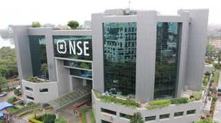 Nifty breaches 10,000 mark for first time