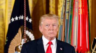 Trump signs Russia sanctions bill into law, calls it 'flawed'