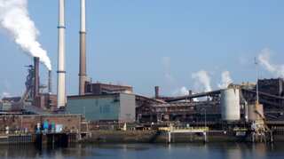 Sensex edges down, Tata Steel rises