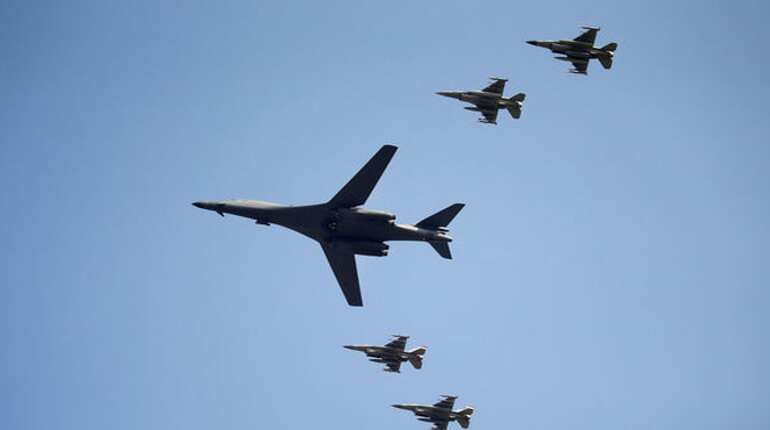 Japanese fighters conducted air drills with US B-1B bombers on Tuesday Japanese fighters conducted air drills with US B-1B bombers on Tuesday