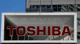 Toshiba shares jump as delisting fears ease