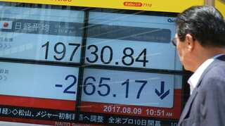 Asian markets fluctuate after Fed hike, Trump China comments