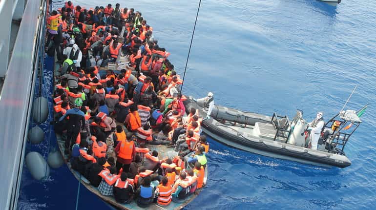 At least 56 dead as human traffickers throw 300 African migrants into Yemen sea At least 56 dead as human traffickers throw 300 African migrants into Yemen sea