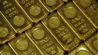 Gold inches down from near-two month high