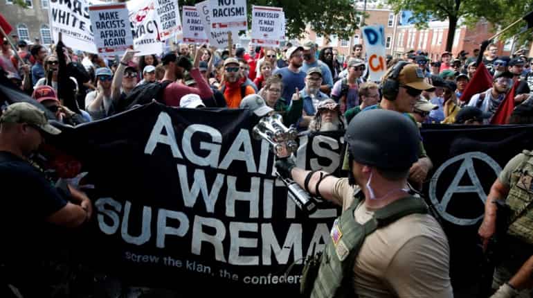 One dead, 19 injured as car rams into crowd at white nationalist rally in Virginia