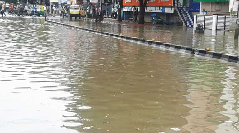 Heavy rains disrupt life in Bengaluru, Bellandur Lake spills toxic foam again