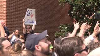 Crowd attacks white nationalist rally organizer in Charlottesville