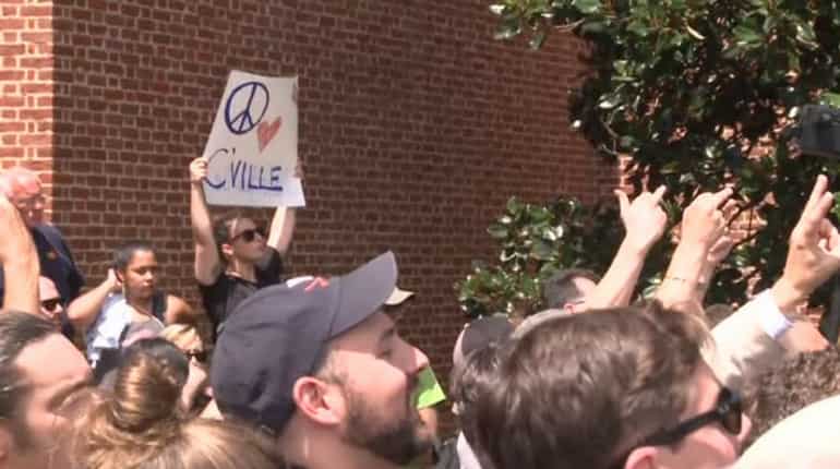 Crowd attacks white nationalist rally organizer in Charlottesville
