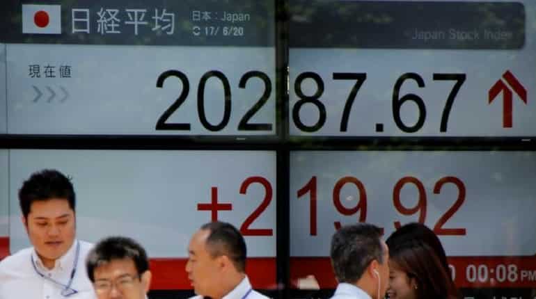 Tokyo stocks open slightly lower in muted trading