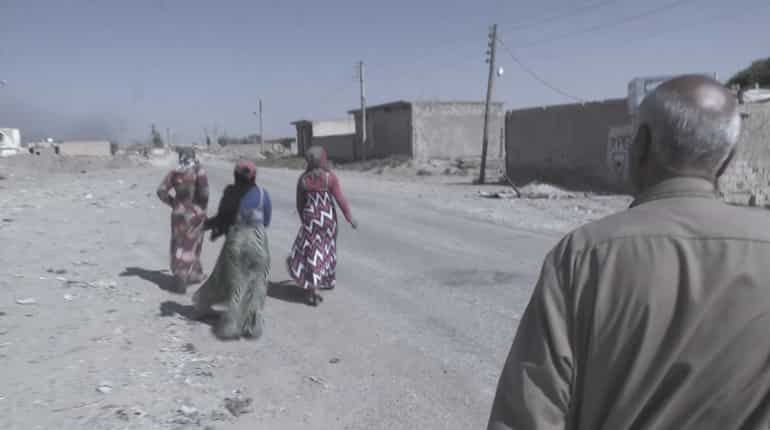Civilians brave dangers to wait out IS exit from Syria's Raqa Civilians brave dangers to wait out IS exit from Syria's Raqa