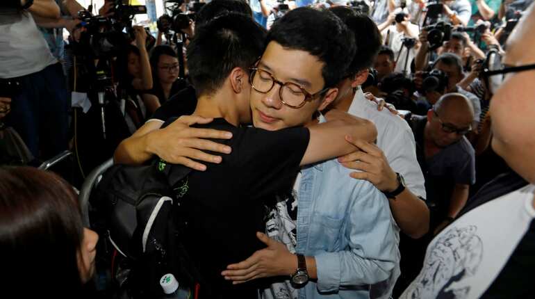 Three young Hong Kong democracy leaders jailed for months