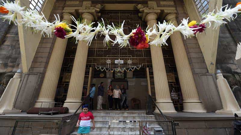 Indian Parsis greet each other at a Fire Temple during Navroze, the Parsi New Year, in Mumbai on August 17, 2017.