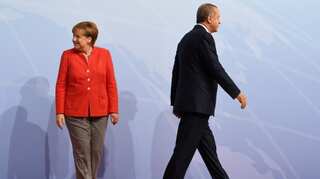 Berlin hits back after Turkish President Erdogan asks Turks in Germany to vote against Angela Merkel