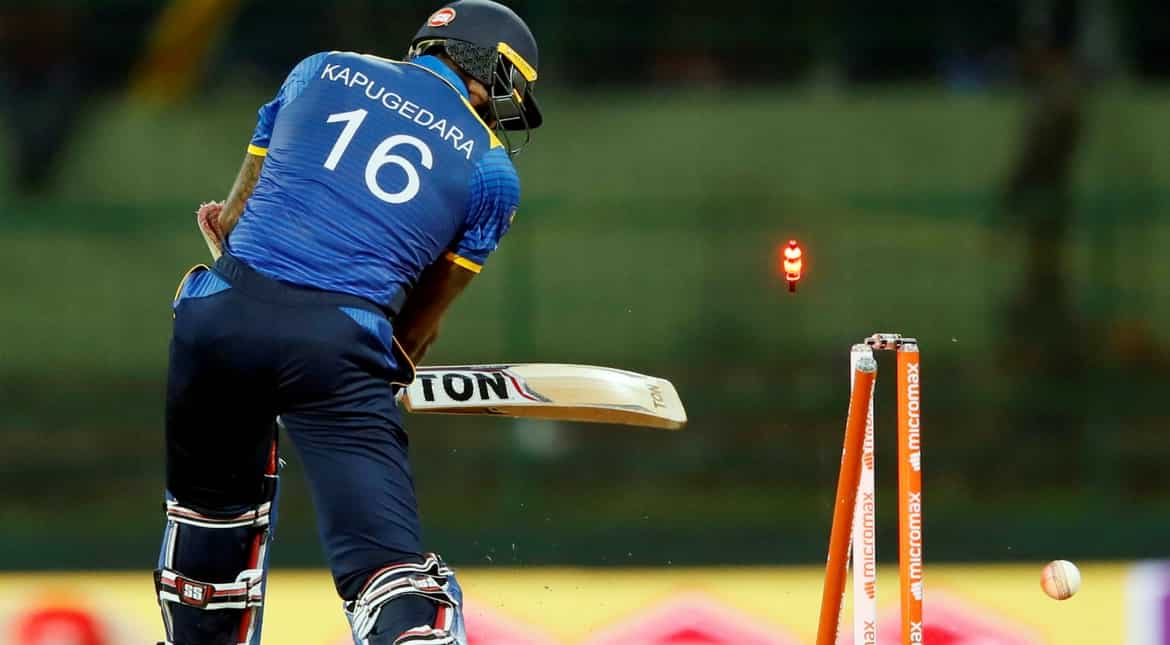 Sri Lanka's Chamara Kapugedera is bowled out by India's Jasprit Bumrah