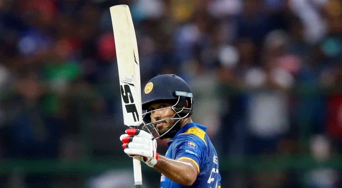 Sri Lanka's Milinda Siriwardana celebrates his half century