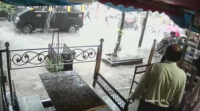 Mumbai rain: 14 dead as city limps back to life