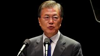 South Korean president declares 'war' on coronavirus as sect leader tests negative