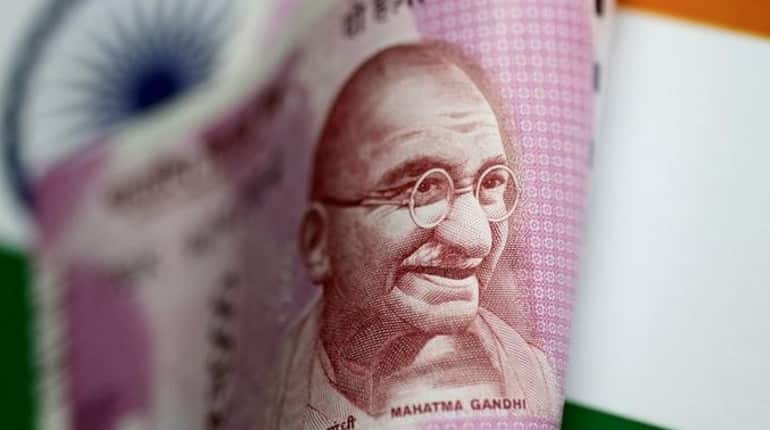 Rupee rises 21 paise to 69.49 against US dollar in early trade