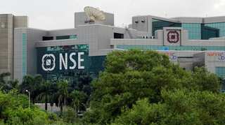 Nifty hits record high, auto stocks gain