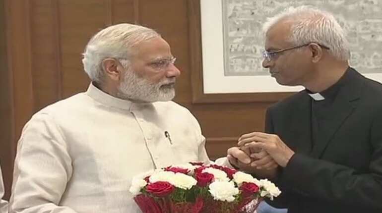 Indian priest rescued from IS captivity arrives in India, meets PM Modi