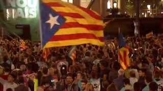 Catalan leader threatens independence after winning 90% of vote