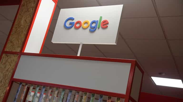 Google relaxes rules on free news stories, plans subscription tools