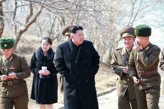 North Korea's Kim promotes sister, reaffirms nuclear drive