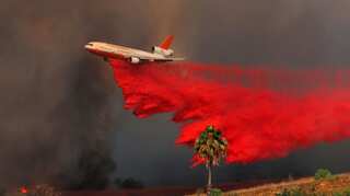 Wildfires kill 10 in California