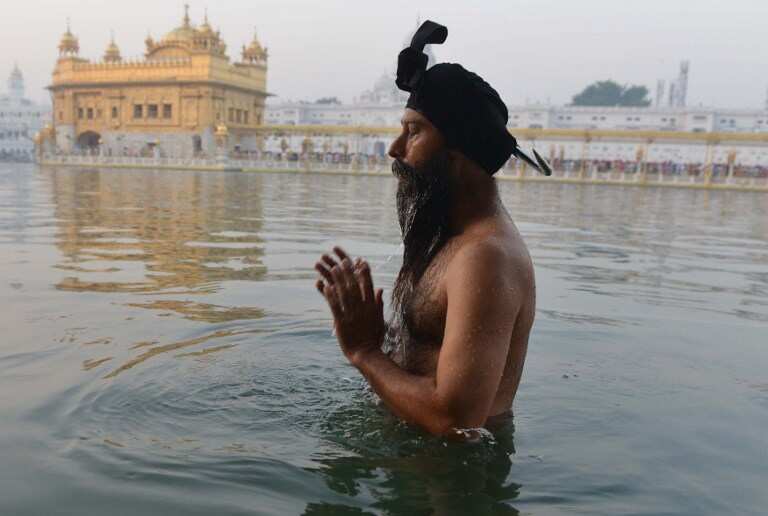 Holy dip at sarovar