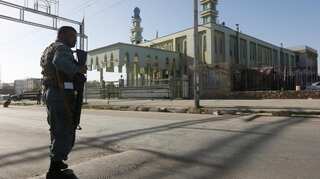 At least 72 dead after suicide bombers attack two Afghan mosques