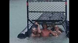 'Idiots of the century' swim in baited crocodile trap