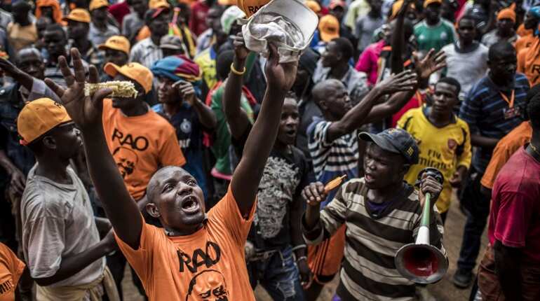 Divided Kenya votes in fractious second election Divided Kenya votes in fractious second election