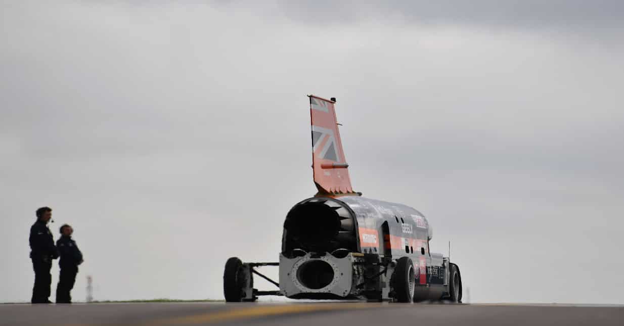 The engine of the Bloodhound supersonic car is started as Andy Green, Royal Air Force Wing Commander prepares for a test run.
